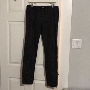 Button fly coated black skinny jeans